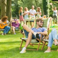 Couple outside at family picnic 
