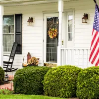 house-with-american-flag-and-lawn